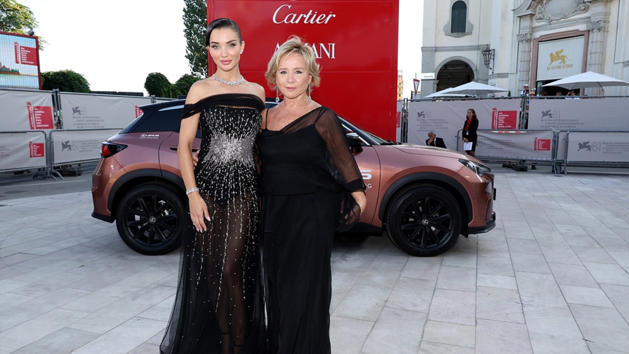 Amy Jackson and Alberta Ferretti stood in front of a Lexus at the Venice Film Festival.