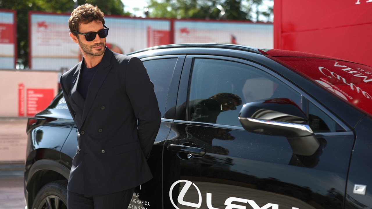 Stefano De Martino stood by a Lexus at the 81st Venice film festival